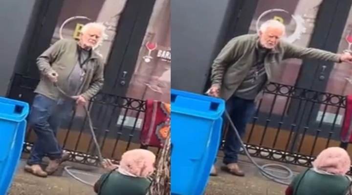 Indignante video: Hombre agarró manguera y le lanzó agua a una habitante de calle